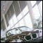 (g) Louvolite System 40 Custom Roller Shade with Phifer SheerWeave Sun Control Solar Fabric Style 4800 - 1% Open